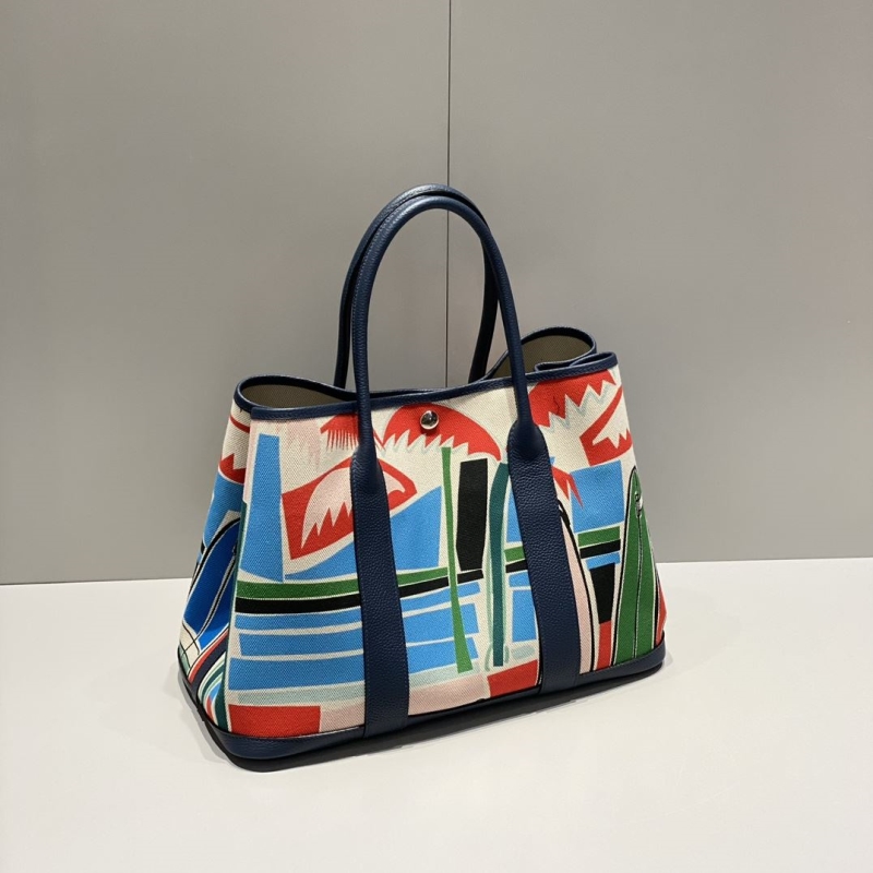 H**mes shopping bags
